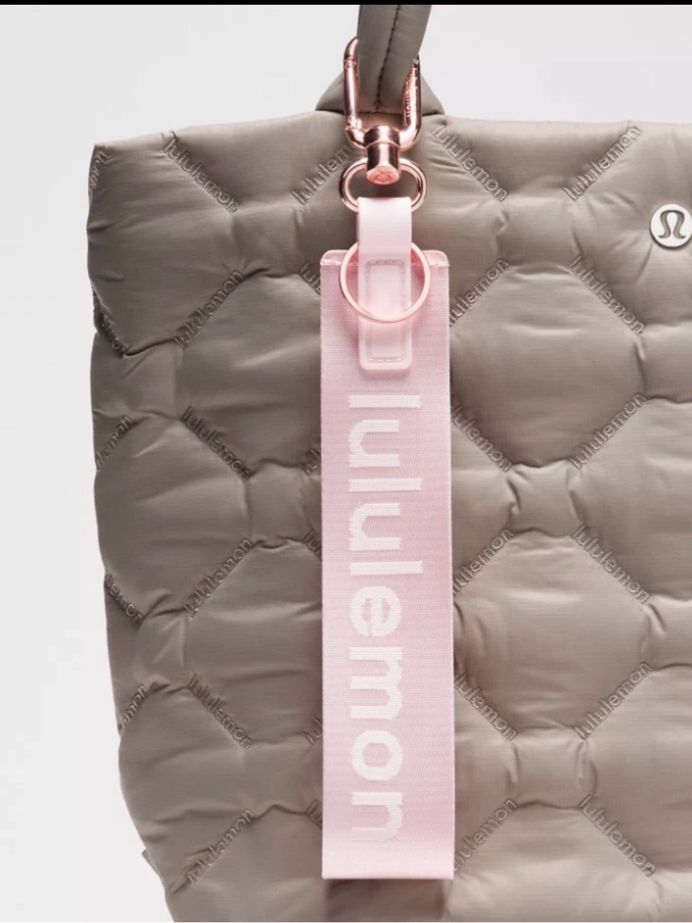 LULULEMON NEVER LOST KEYCHAIN PINK PEARL/WHITE/ROSE GOLD NEW WITH TAGS!